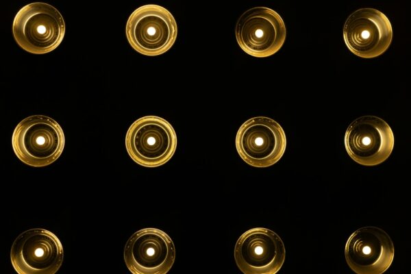 Gold Round Metal Tools on Black Background